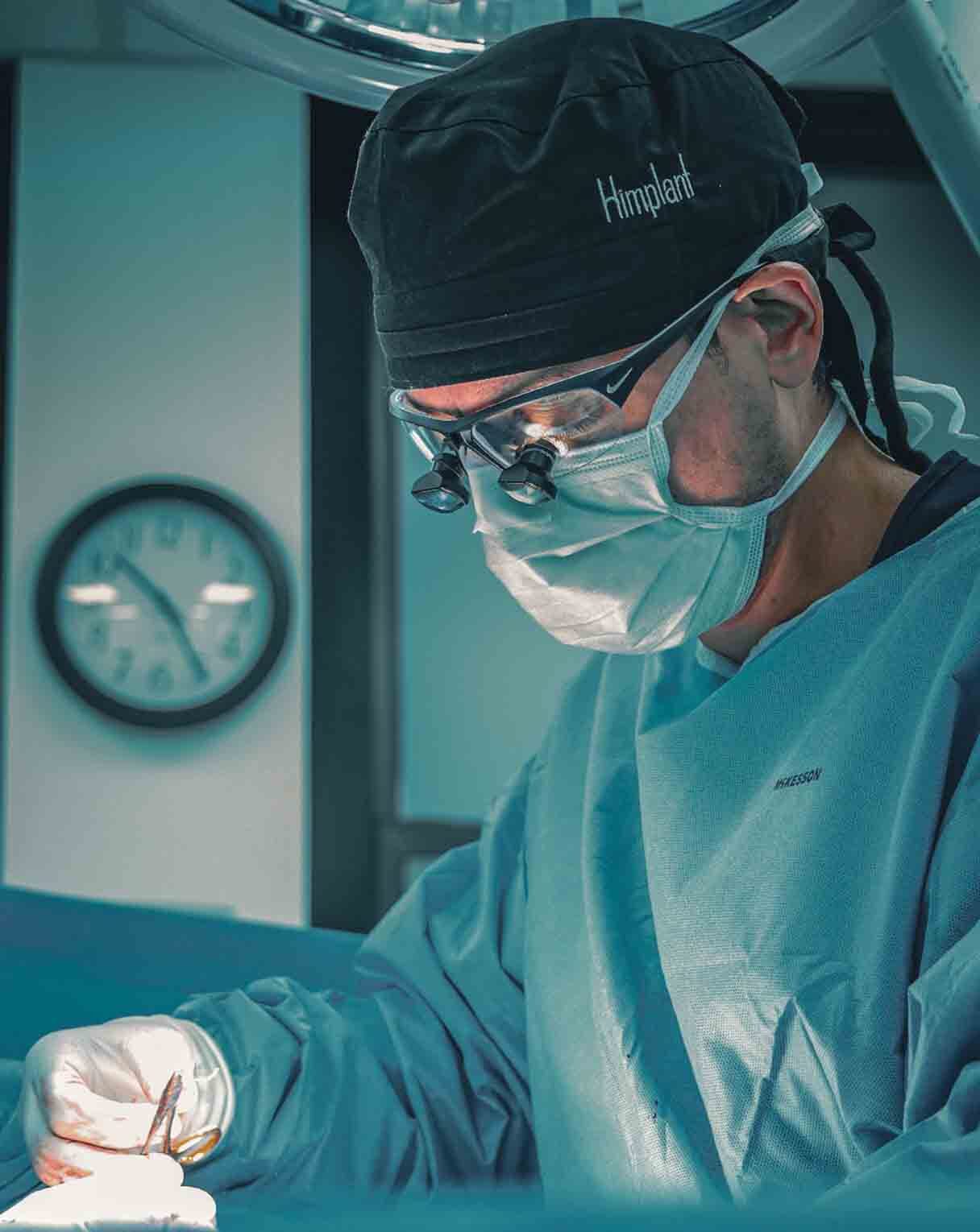 Dr. David Shokrian performing glans enlargement surgery in a New York operating room