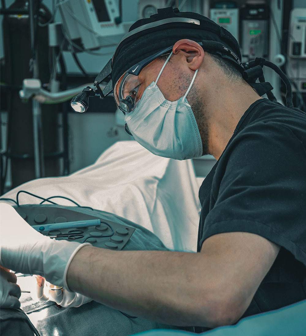 Penile enhancement surgeon performing a procedure in a New York City operating room